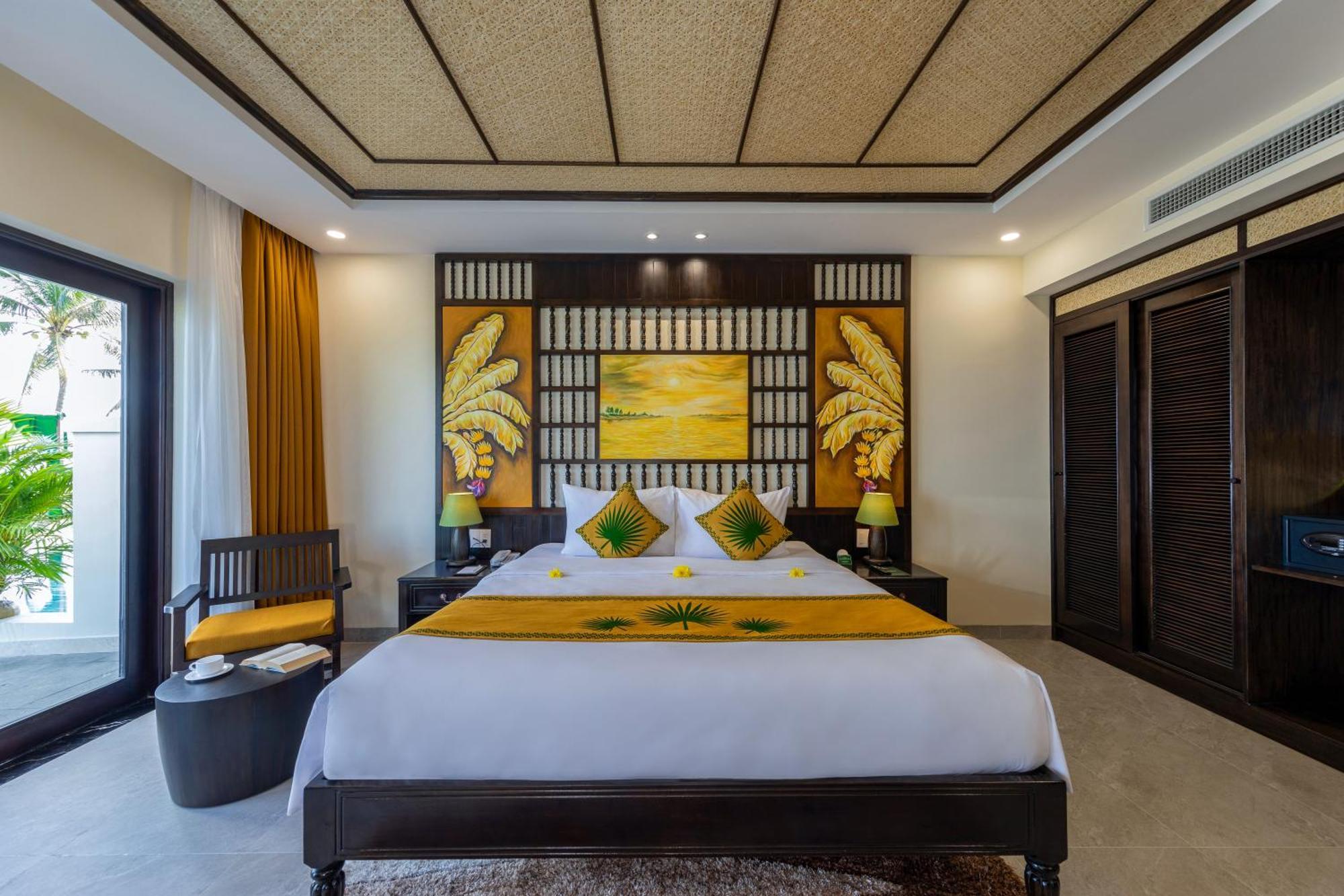 Palm Garden Beach Resort & Spa Хоян Екстер'єр фото A bedroom at the resort