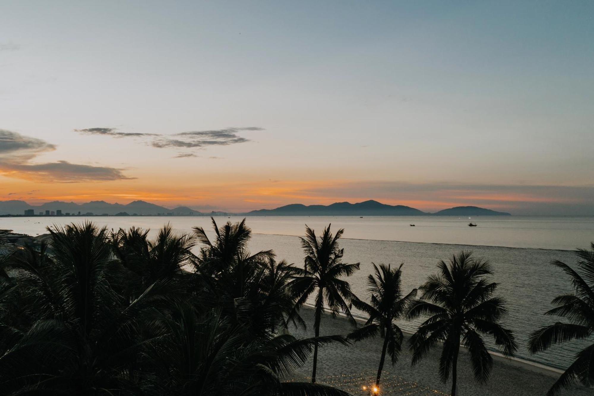 Palm Garden Beach Resort & Spa Хоян Екстер'єр фото Sunset at the beach